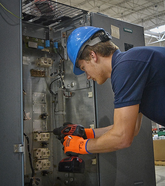 Employee Breaking Down Equipment