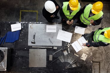 Overhead 4 Workers discussing safety Report