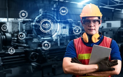 Plant Worker With Graphic Showing Wireless Technology concepts