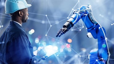 Worker Wearing Blue with Blue Robot Arm