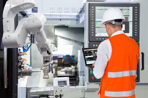 Worker in Orange Vest with Robot