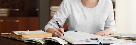 female-torso-writing-in-books