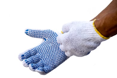 male-hands-putting-on-safety-gloves
