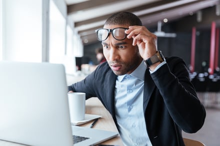 surprised-male-looking-at-computer-screen