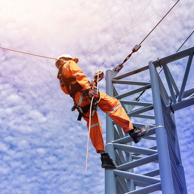 worker_climbing_safetyropes_sky_web
